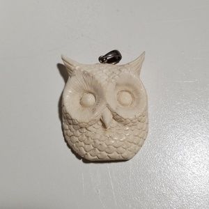 Owl pendant carved from deer antler